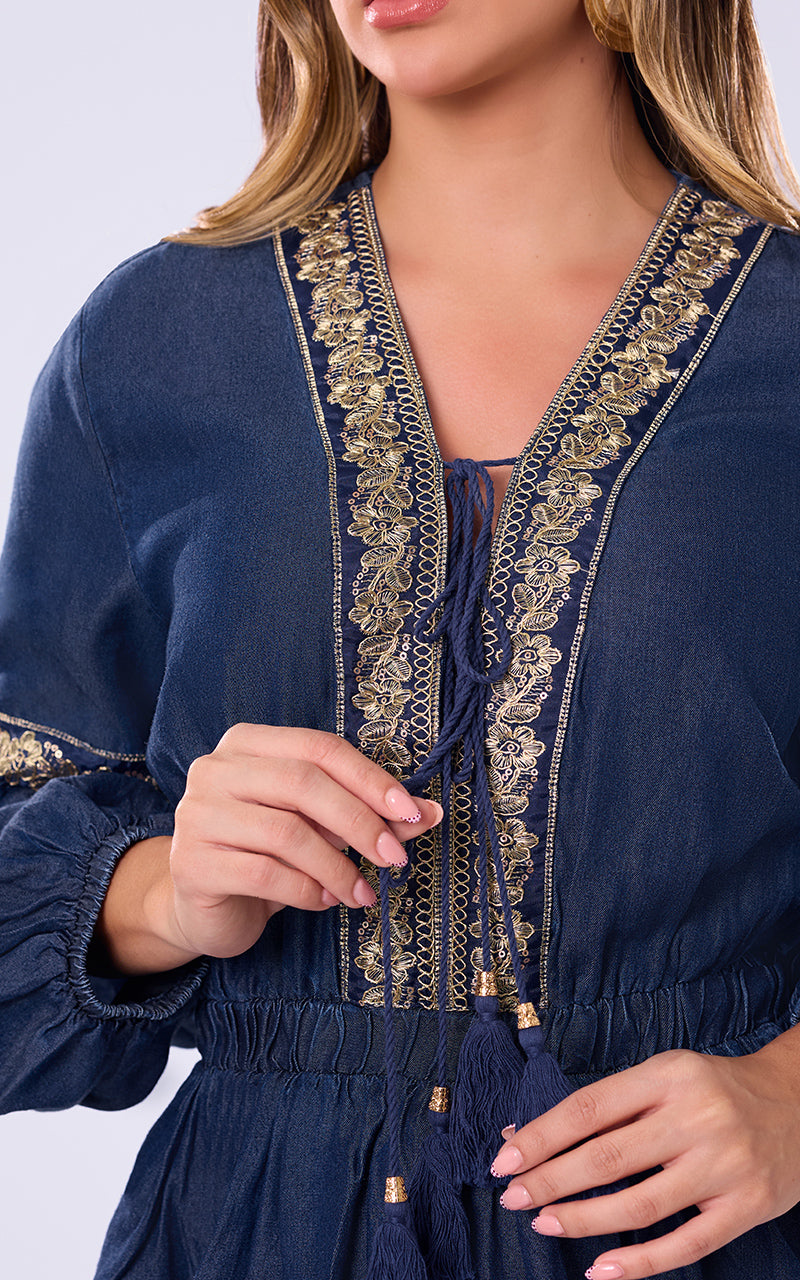 BLUSA CON DETALLES BORDADOS